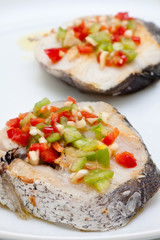 Lomos de merluza al horno con pimientos