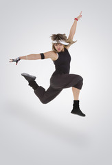 Fototapeta na wymiar Teenager dancing breakdance in action