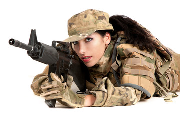 Fototapeta premium Beautiful army girl with rifle is aiming