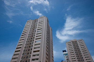 Fototapeta na wymiar High rise buildings with blue sky