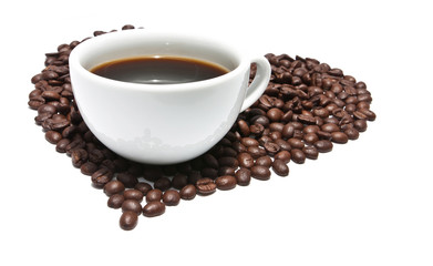Cup of coffee with roasted coffee beans in the shape of the hear