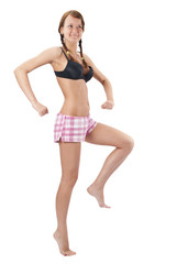 Beautiful young woman in pink shorts