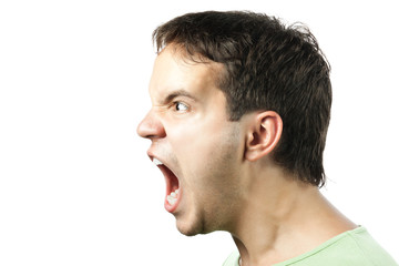 Obraz premium portrait of young angry man sreaming isolated on white