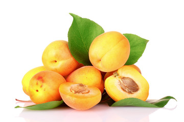 Naklejka na ściany i meble apricots with leaves isolated on white