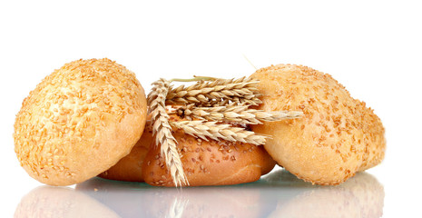 bagel and buns with sesame seeds and spikelets isolated on white
