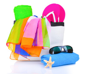 Naklejka premium beach bag with things isolated on white
