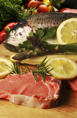 Carne con pescado y verduras