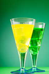Colourful cocktail in glasses with ice