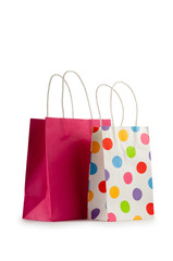 Colourful paper shopping bags isolated on white