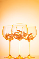 Glasses of water against gradient background