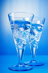 Water in the glass against gradient background