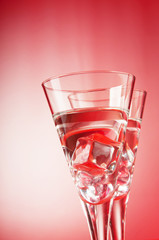 Water in the glass against gradient background