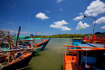 Fototapeta na wymiar Scene of fishing boats at a port in Thailand
