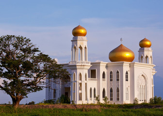 View of islamic mosque on sunset