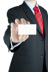 Blank business card in a businessman's hand