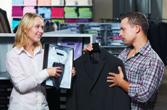 Young couple at clothes shopping