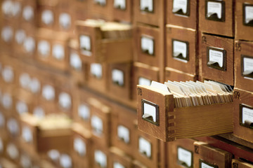 Fototapeta database concept. vintage cabinet. library card or file catalog. obraz