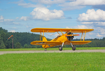 Old classic biplane on airport