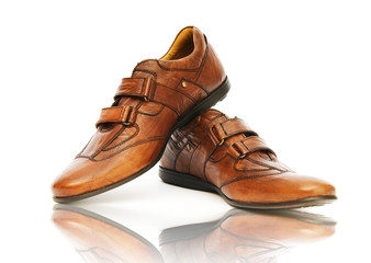 Fashion concept with male shoes on white