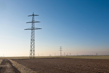 tower with powerlines in winter