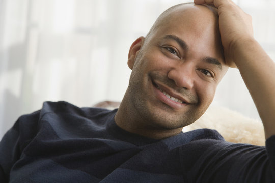 Mixed race man smiling