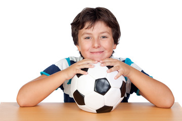 Adorable boy with a soccer ball