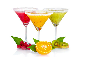 Delicious fruit smoothies and fruit isolated on white