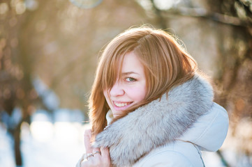 Young woman winter portrait. Shallow dof.