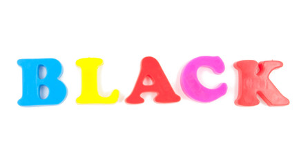 black written in childs fridge magnets on white