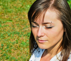 Beautiful young woman enjoying nature