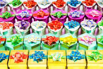 Fototapeta na wymiar Many colourful gift boxes
