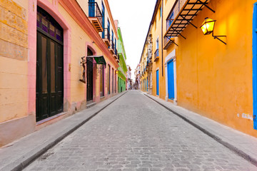 Street in Old Havana sidelined by colorful buildings