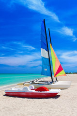 Catamaran and paddle boatson the beach of Varadero in Cuba