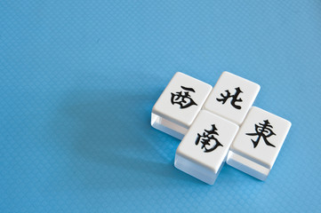 mahjong tiles of direction, east, south, west, north
