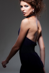 Fototapeta premium alluring woman in evening dress
