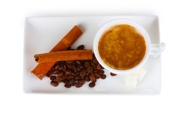 cup of coffee, coffee beans and cinnamon isolated on white