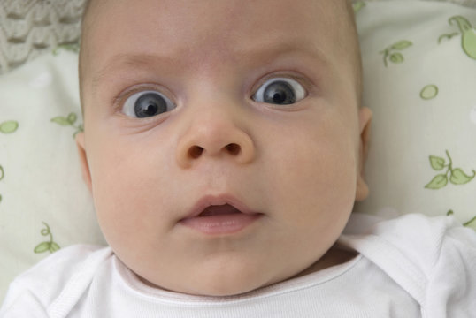Close up of surprised baby