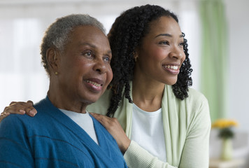 Mother and daughter hugging