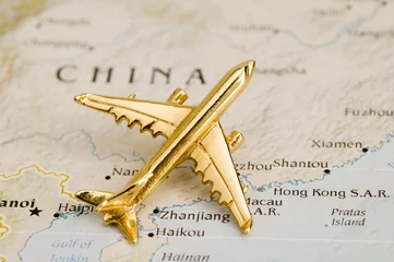 Fotobehang Vliegtuig boven China © Jesse Kunerth