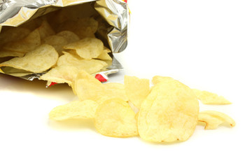 Pile of potato chips isolated on white background