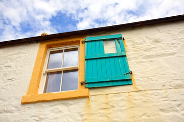 Old window with wooden shutters