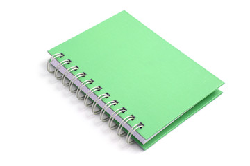 Green notebook isolated in white background