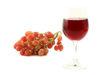 Red wine glass with grape isolated on white background