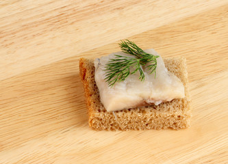 Herring on a piece of rye bread