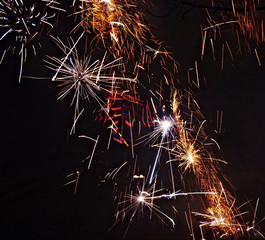 bright festive fire abstraction on black background