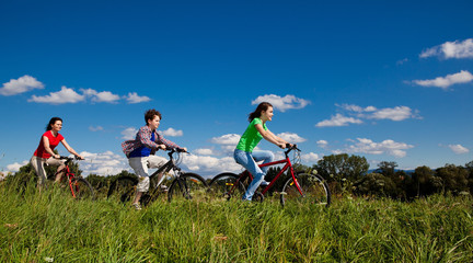 Family riding bikes
