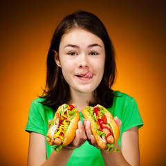 Girl eating big sandwiches