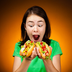 Girl eating big sandwiches