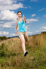 Girl jumping, running outdoor