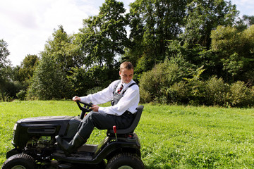 Fototapeta premium Man and mower.